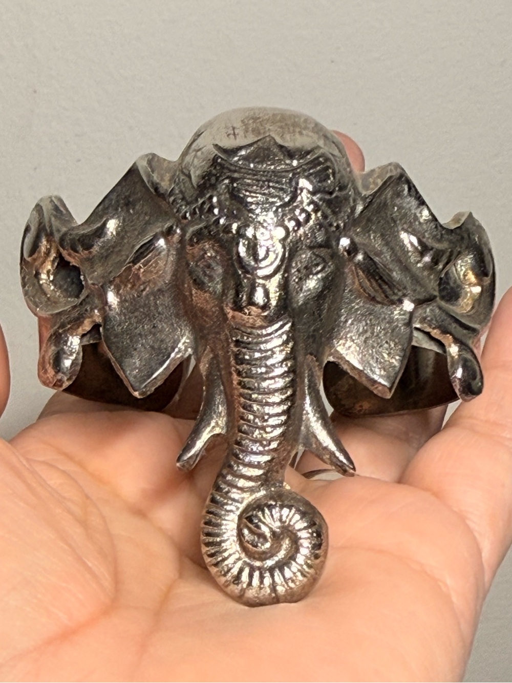This is a statement cuff bracelet featuring Lord Ganesha